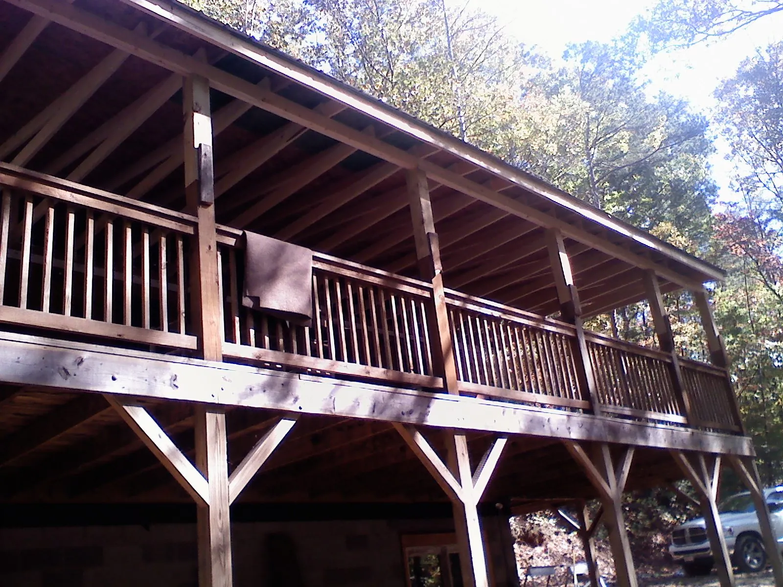 Timber framing under a new elevated porch and deck — Roof Leak Repair in Morenci by Roofing Brothers